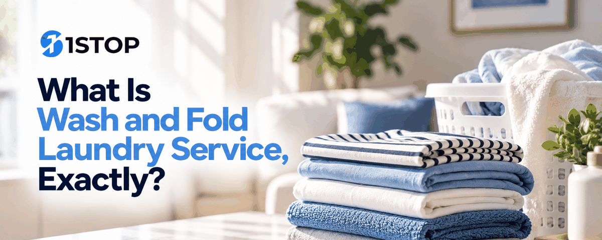 Freshly washed and folded laundry stacked on a counter