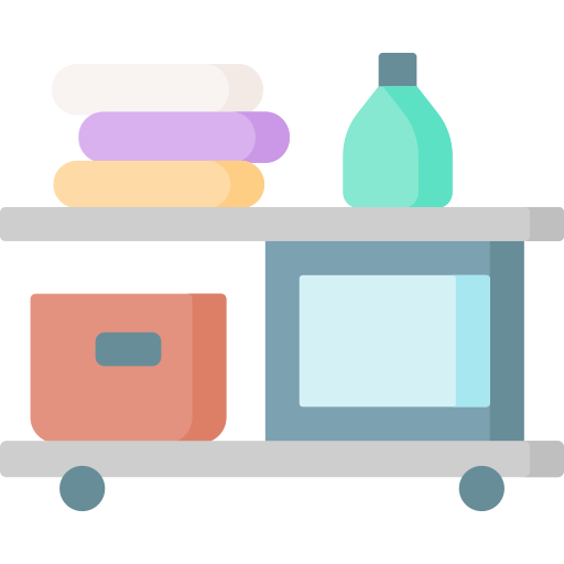 Two-tier gray cart on wheels with folded towels and a bottle on the top shelf, and a box plus a microwave on the lower shelf.